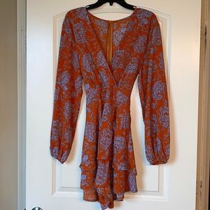 Small red & blue long sleeve romper